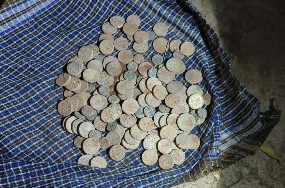 Ancient Indian silver coins unearthed using an Minelab Equinox 600 metal detector.