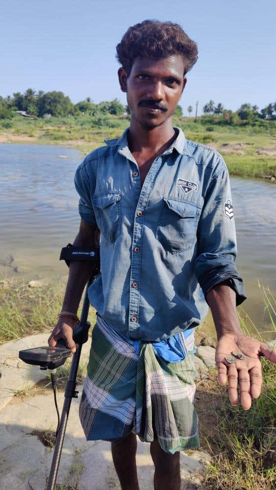A coin hunter from a nearby village